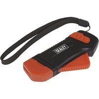 Black and orange Sealey emergency rescue tool with strap, featuring a hammer and seatbelt cutter.