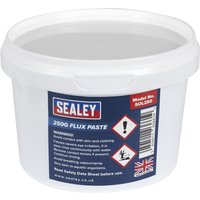 White Sealey Flux Paste tub with blue label, safety icons, and UK flag, model SOL2300.