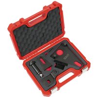 Red Sealey tool set with black front pulley and flywheel locking tools in a foam-lined case.