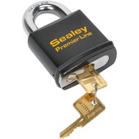Black Sealey heavy duty steel padlock with yellow branding and two brass keys inserted.