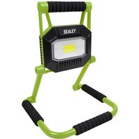 Green and black Sealey rechargeable fold flat floodlight with COB LED and ergonomic handle.
