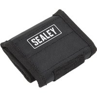 Black Sealey magnetic wristband with textured fabric and white logo on top.