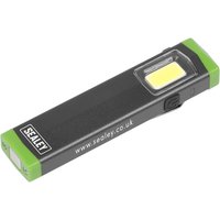 Black Sealey mini torch with green ends, pocket clip, and rectangular LED inspection light.