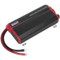 Black and red Sealey power inverter with ribbed casing and attached cables, labeled "2000W Power Inverter."