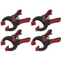 Set of four black and red Sealey quick ratchet clamps with ergonomic handles and adjustable jaws.