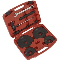 Red Sealey coil spring compressor kit with black clamps and silver wrench in a molded carrying case.