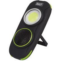 Black Sealey rechargeable torch with 10W COB LED, integrated wireless speaker, and green accents.
