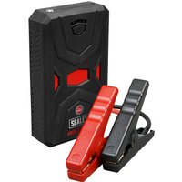 Black and red Sealey RS600 jump starter with rugged design, featuring red and black clamps attached.