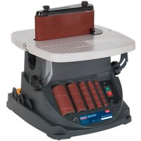 Sealey SM1300 sander with gray base, red belt, spindle attachments, and control panel on the front.