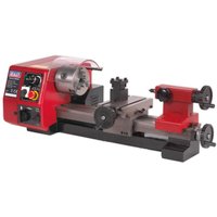 Red and silver Sealey mini metalworking lathe with control panel, chuck, and tool post on a black base.