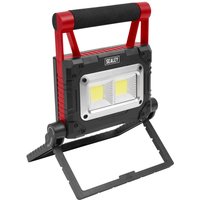 Black and red Sealey solar rechargeable COB LED work light with dual LED panels and adjustable stand.