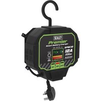 Sealey SPBC12 black battery charger with digital display, green accents, and UK plug, featuring a hanging hook.
