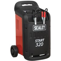 Red and black Sealey START320 heavy duty starter/charger with wheels, handle, and attached jumper cables.