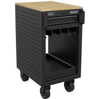 Black Sealey tool storage rack trolley with perforated sides, wooden top, drawer, and four caster wheels.