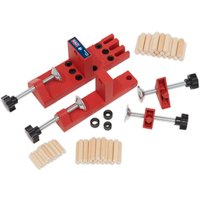 Red Sealey Universal Dowelling Jig Set with clamps, multiple drill holes, and wooden dowels included.