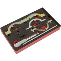 Red and black Sealey timing tool kit with metal components for GM, Chevrolet, Suzuki engines in foam-lined case.