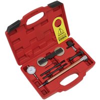 Red Sealey timing tool kit with various metal tools and a gauge, housed in a molded plastic case with handle.