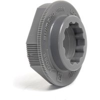 Gray Shimano SPD Axle Removal Tool with ridged grip and hexagonal shape, featuring internal grooves for axle fitting.