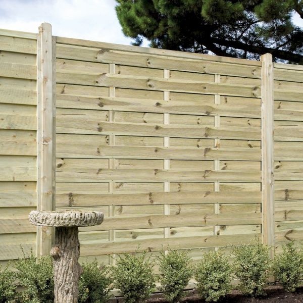 Square wooden garden panel in light green, measuring 6ft x 5ft, featuring horizontal slats and sturdy vertical posts, set against a backdrop of greenery and a stone birdbath.
