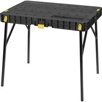 Black Stanley fold-up workbench with perforated top, yellow accents, and collapsible metal legs.