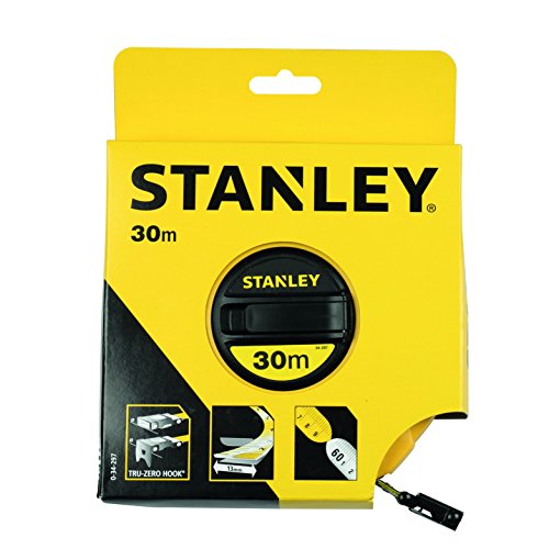 Closed case fibreglass tape measure by Stanley, 30m long and 12.7mm wide, featuring a yellow and black design with a Tru-Zero hook and clear measurement markings.