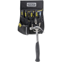 Black Stanley tool holder with multiple pockets, containing screwdrivers, pliers, and a hammer with a rubber grip.