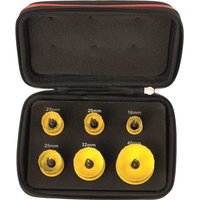 Black case with six yellow bi-metal hole saws, various sizes, by Starrett, arranged in foam insert.