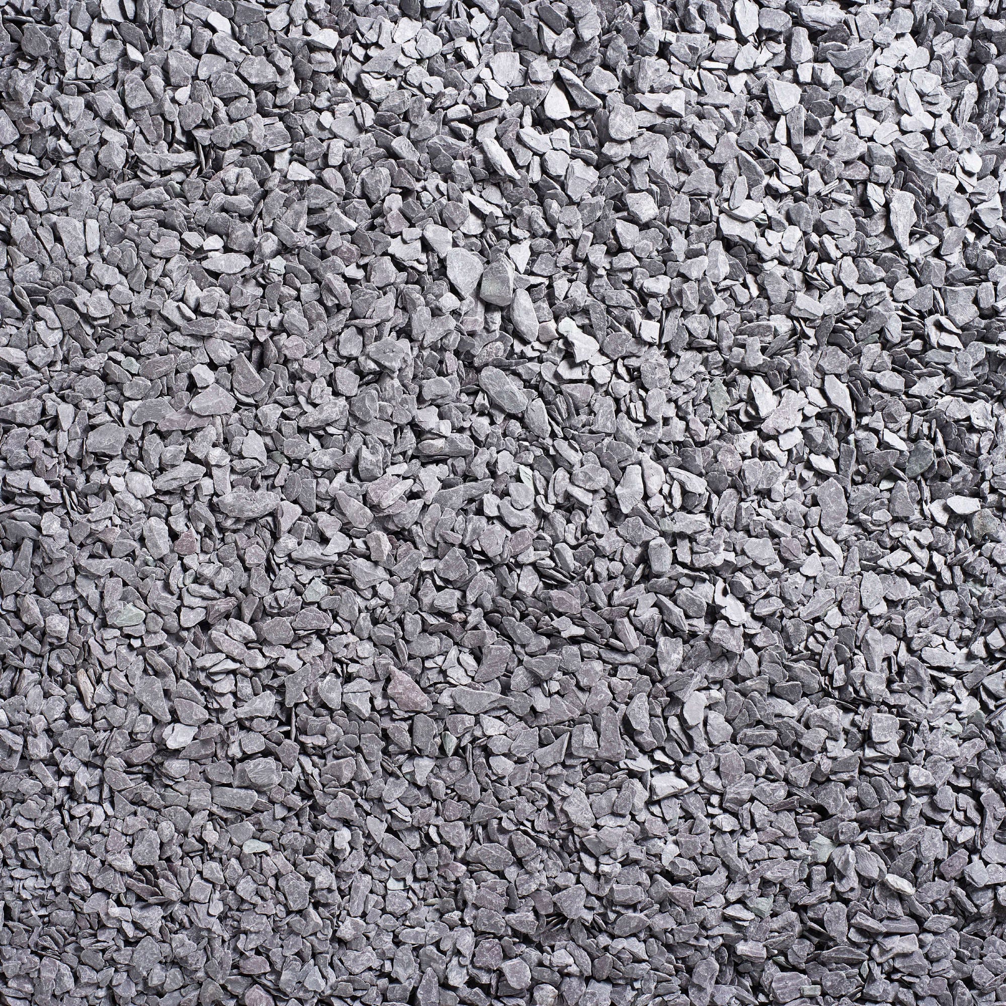 Plum slate decorative aggregate in a bulk bag, featuring small, irregularly shaped chippings in varying shades of grey and purple, ideal for landscaping and decorative purposes.