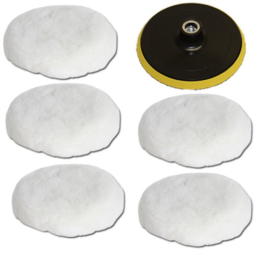 White polishing pads and a black backing plate with a yellow edge, featuring six pads in total, designed for polishing surfaces.