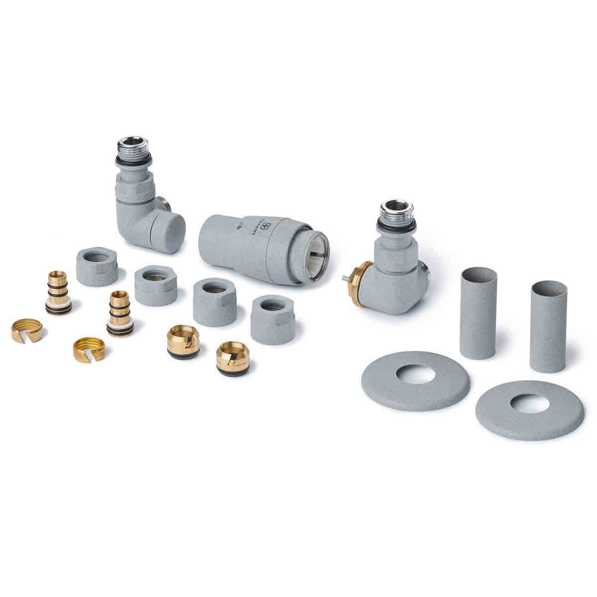 Terma Accessory Valves set in salt and pepper color, featuring three 3-axis corner TRVs, pipe masking, and various brass and gray components for installation.