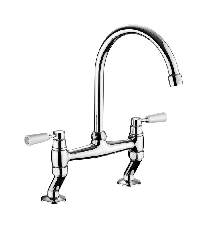 Traditional dual lever bridge tap in chrome with white ceramic lever handles, featuring a high arched spout and a polished finish for a classic kitchen look.