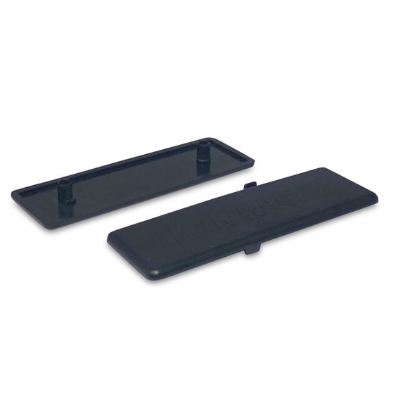Black ABS end caps designed for Trak Racer cockpits, featuring a smooth surface with raised branding, measuring 160 x 40mm, ideal for finishing extruded aluminum profiles.