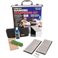 "Trend Complete Diamond Sharpening Kit with silver case, sharpening stones, honing fluid, and green honing compound"