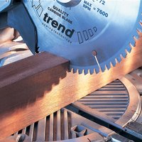 Circular saw blade by Trend, 250mm, 24 teeth, cutting wood, silver with black text and logo.