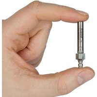 Trend Mini Guided Round Over bit, silver, 2.4mm radius, 9.5mm length, held between fingers, cylindrical shape.