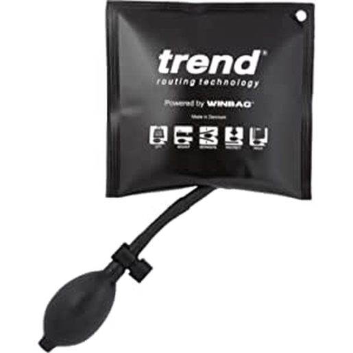 Black air wedge lifting tool with a flexible rubber bulb for inflation, designed for door and window installation, featuring a 135kg capacity and marked with "Trend" and "WINBAG."