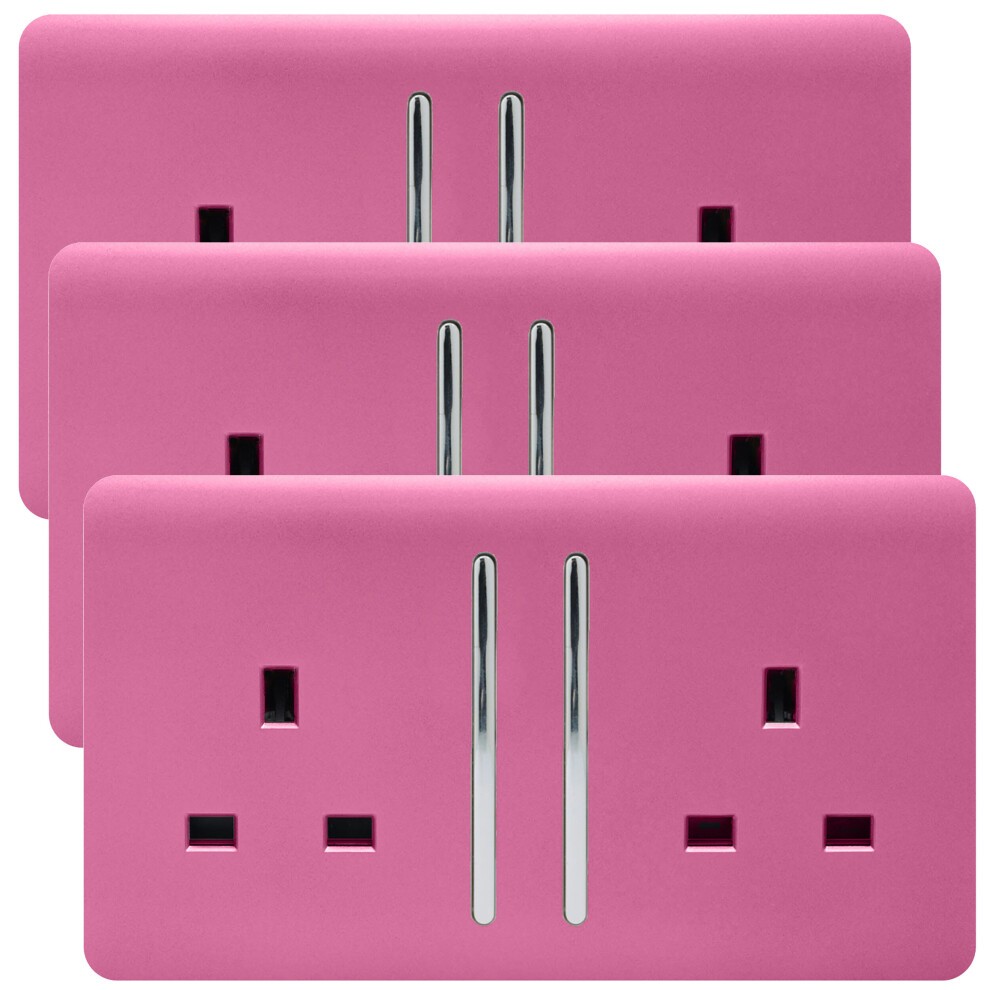 Three glossy pink 2 gang plug sockets with a modern design, featuring two vertical silver switches and two standard UK outlets, ideal for stylish home decor.