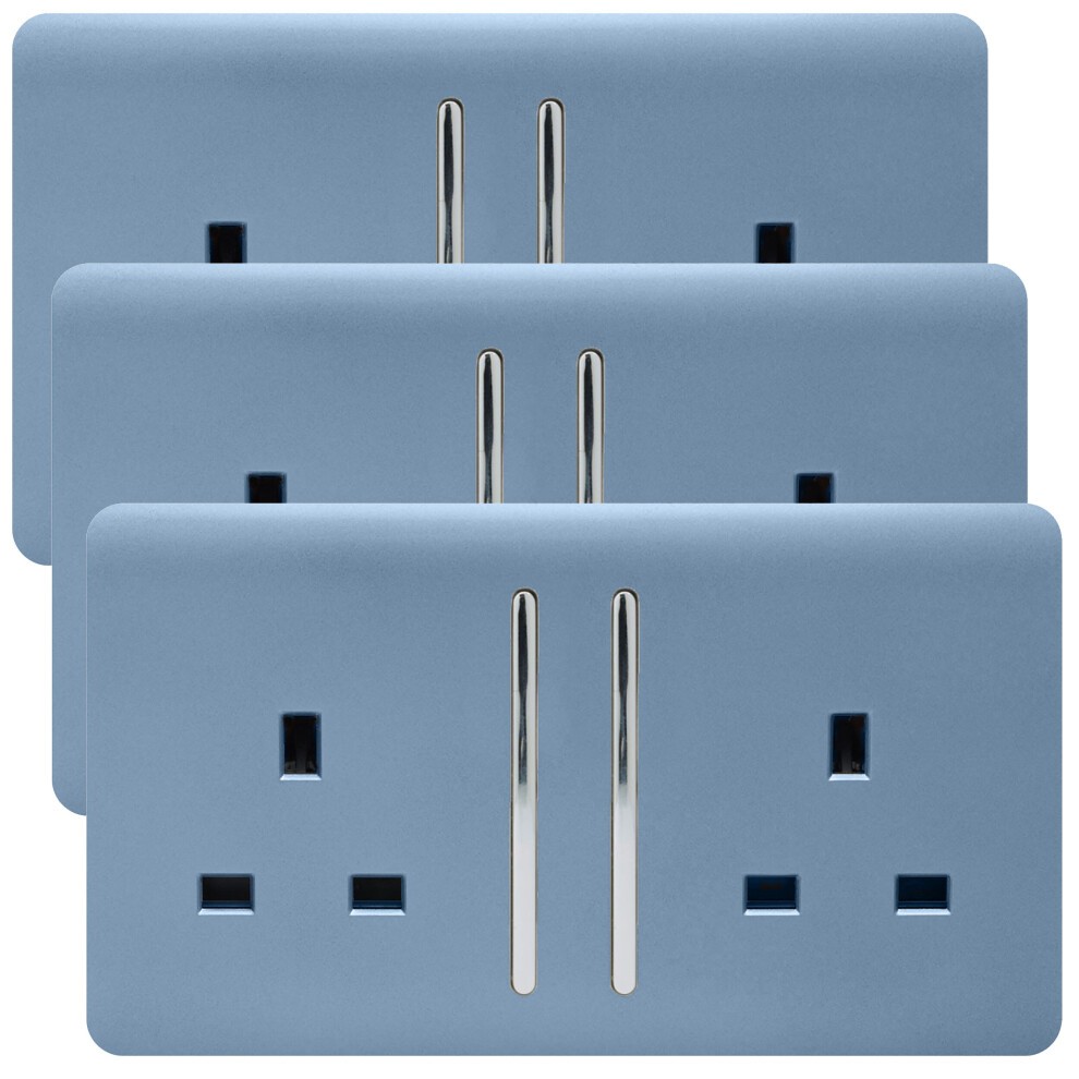 Three glossy sky blue 13 Amp switched plug sockets with a modern design, featuring two vertical chrome switches and standard UK socket configurations.