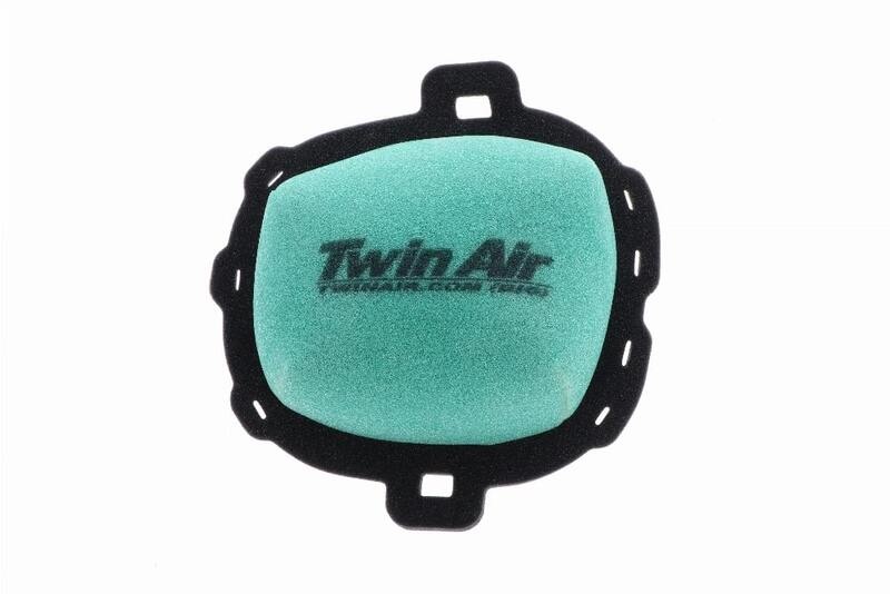 Green pre-oiled air filter with a black foam outer edge, featuring the "Twin Air" logo prominently displayed on the surface, designed for fire resistance.