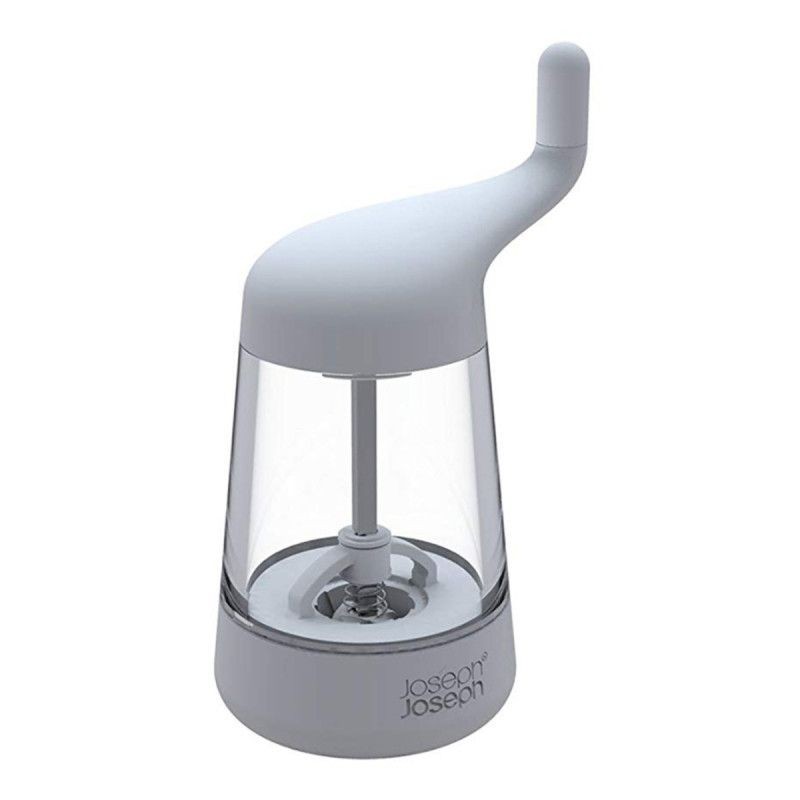 White, sleek salt and pepper mill with a curved top and transparent body, featuring a unique grinding mechanism and a comfortable handle for easy use.