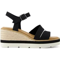 Black TOMS Darya women's wedge sandals with ankle strap, espadrille sole, and white rubber outsole.