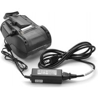 Black Zebra power adapter with attached cable, compact rectangular design, and label on the side.