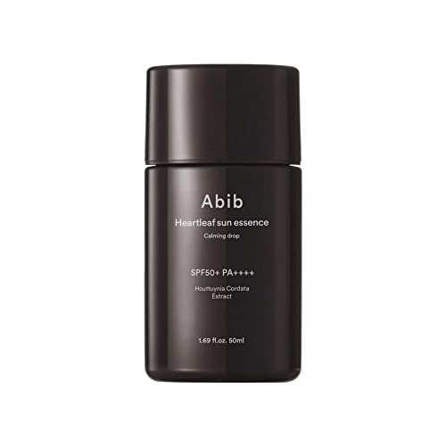 Black cylindrical bottle with a matte finish, labeled "Abib Heartleaf Sun Essence Calming Drop SPF50+ PA++++," containing 50 ml of sunscreen.
