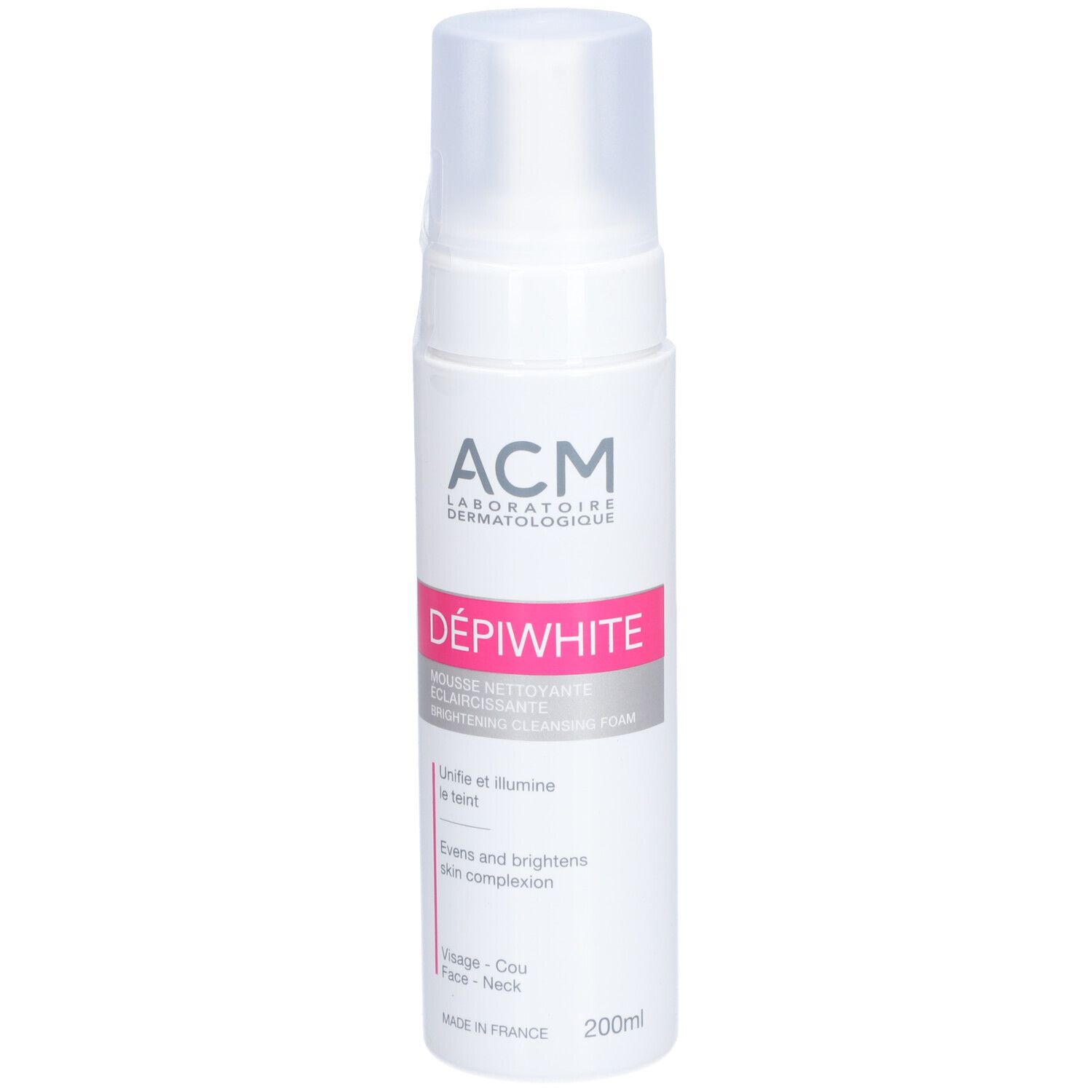 White cylindrical bottle with a pump dispenser, labeled "ACM DÉPIWHITE Illuminating Cleansing Foam," featuring pink accents and a 200 ml capacity, designed for face, neck, and décolleté use.