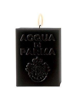 Black cube candle with embossed "ACQUA DI PARMA" text and logo, featuring a single flame on top, showcasing a sleek and modern design.