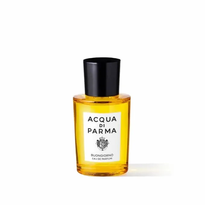 Clear glass bottle with a yellow liquid, featuring a black cap and a white label that reads "ACQUA DI PARMA BUONGIORNO EAU DE PARFUM" in elegant font.