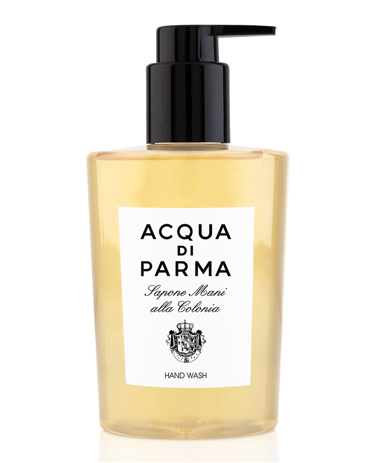 Transparent bottle with a black pump top, filled with light yellow liquid, featuring a white label with black text that reads "ACQUA DI PARMA Sapone Manoi alta Colonia HAND WASH."