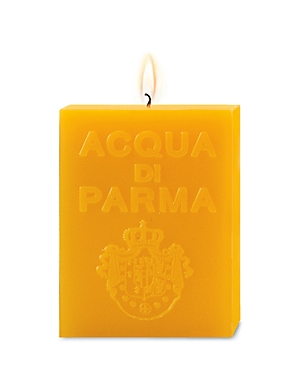 Yellow cube-shaped candle with embossed "ACQUA DI PARMA" text and a crown logo, featuring a single wick on top.