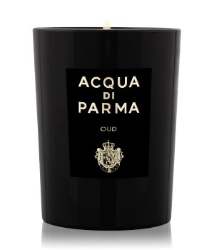 Black glass candle featuring a gold label with "ACQUA DI PARMA" and "OUD," showcasing a sleek, elegant design, ideal for luxury home decor.