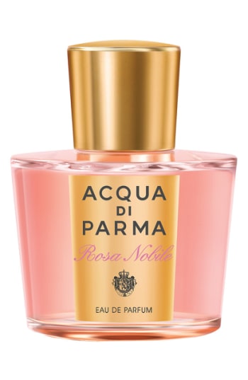 Clear glass bottle with a gold cap, containing pink perfume, featuring a gold and black label with "Acqua Di Parma Rosa Nobile" and "Eau de Parfum" printed prominently.